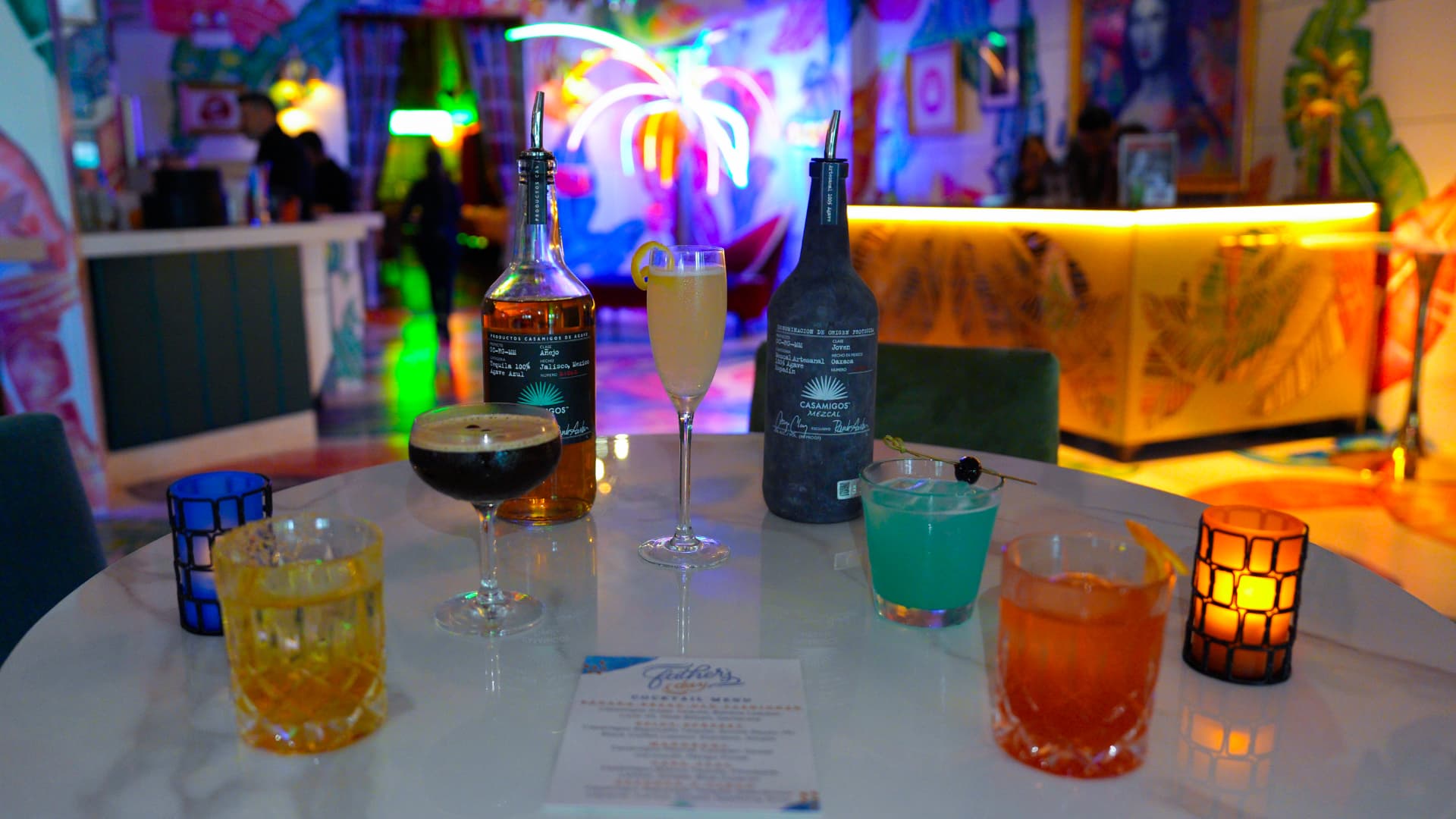 Craft cocktails and agave spirits on a marble bar